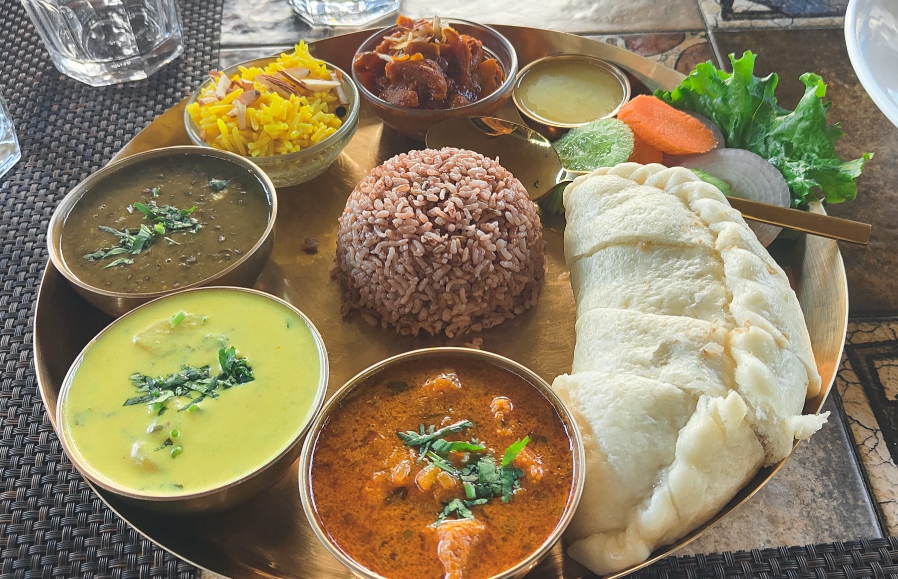 Local Himachali siddu served with red rice